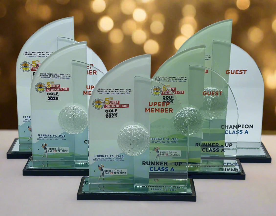 Set of golf tournament awards on a blurred background
