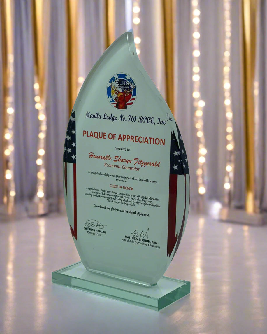Glass plaque with American flag design and text on a white background